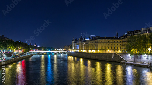 Cite island view with Conciergerie Castle and Pont au Change, over the Seine river timelapse hyperlapse. France, Paris photo