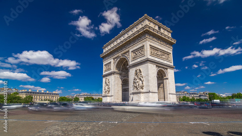 The Arc de Triomphe Triumphal Arch of the Star timelapse hyperlapse is famous monument in Paris photo