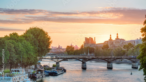 View to Pont des Arts in Paris at sunset timelapse, France photo