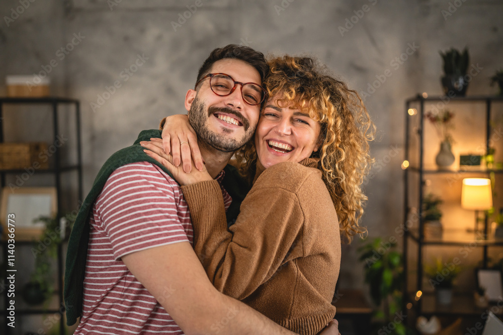 Portrait of couple girlfriend and boyfriend in love hug at home Portrait of couple girlfriend and boyfriend in love hug at home