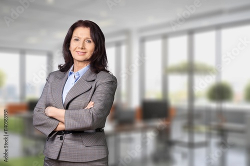 Free Download Portrait beautiful young businesswoman standing in the office - GFXLoad