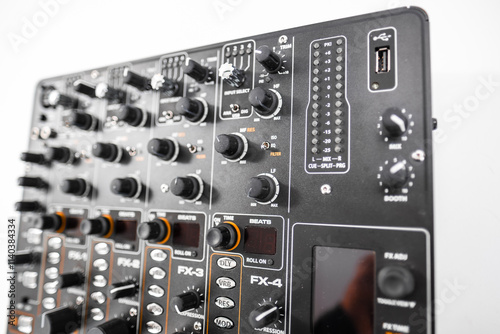 Close-Up Shot of an Audio Mixer With Various Control Knobs and Settings