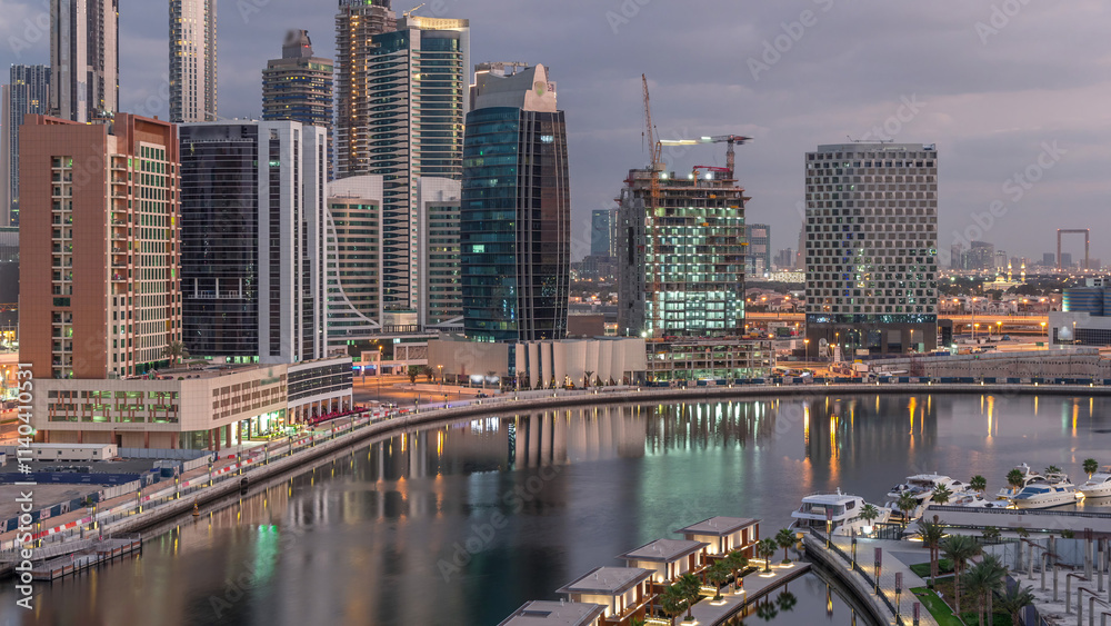 Naklejka premium The rhythm of the city of Dubai from night to morning aerial timelapse