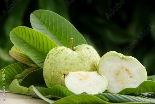 Crystal guava or Psidium guajava, sliced crystal guava on a table with natural background