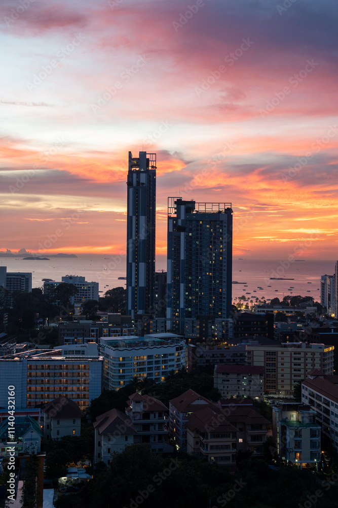 Obraz premium Sunset view from the 22nd floor of a condominium in Pattaya town Chonburi district Thailand Asia