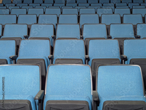 Generated iEmpty Rows of Modern Blue Auditorium Seats in an empty Hall mage