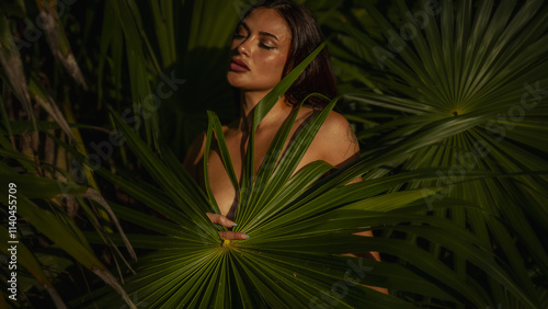 female model posing in bikini in the jungle during the golden hour in Playa del Carmen, Mexico.
