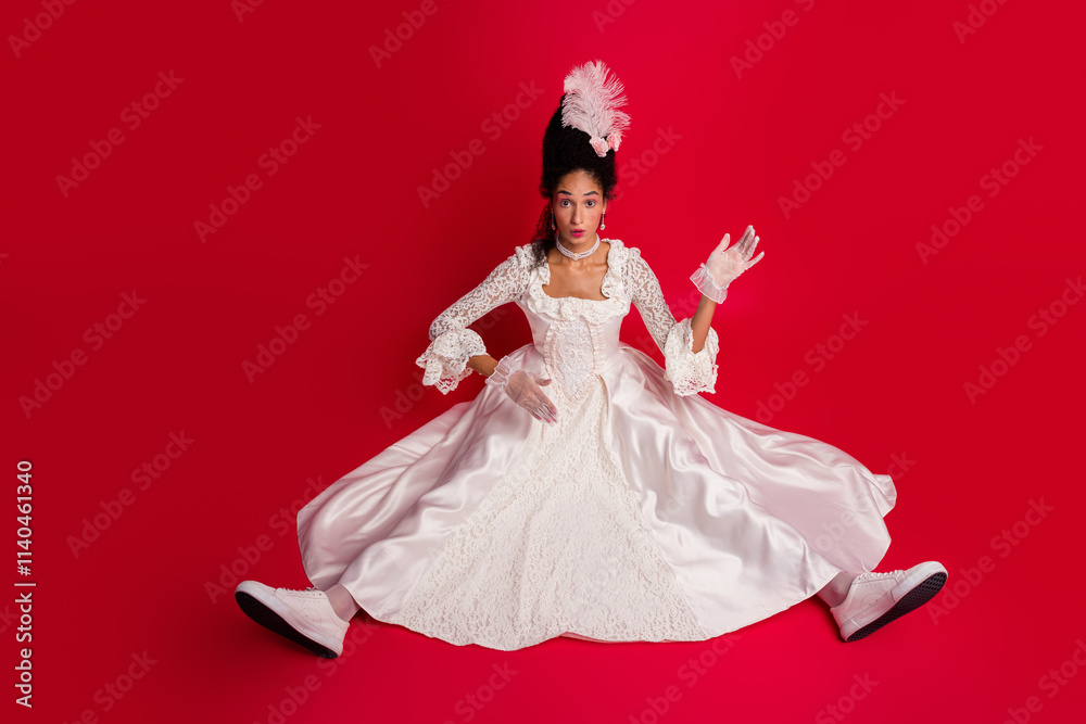 Photo of stunning lady sit moving hands like doll princess wear white antique style clothes isolated red color background Photo of stunning lady sit moving hands like doll princess wear white antique style clothes isolated red color background