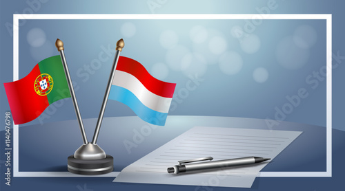 Portugal and Luxembourg National flags on small table with bokeh background, cooperative relationship