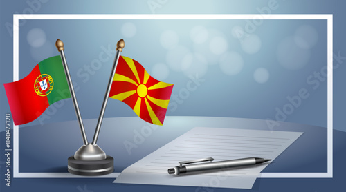 Portugal and Macedonia National flags on small table with bokeh background, cooperative relationship