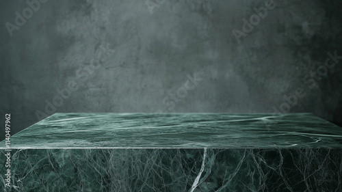Empty green marble table top on dark background. Concept of product display, platform, backdrop.