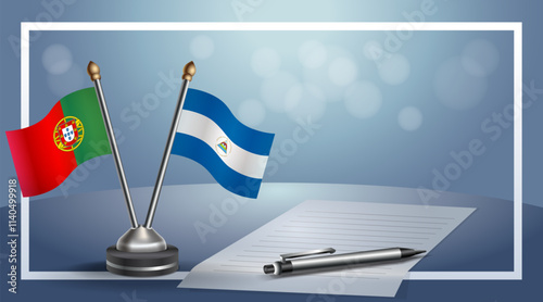 Portugal and Nicaragua National flags on small table with bokeh background, cooperative relationship