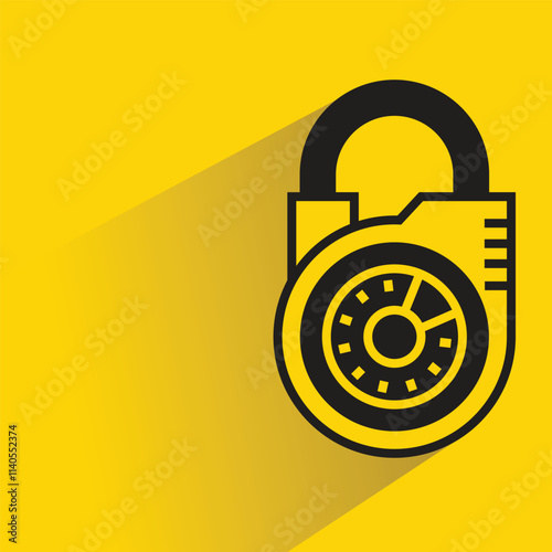 padlock key with shadow on yellow background