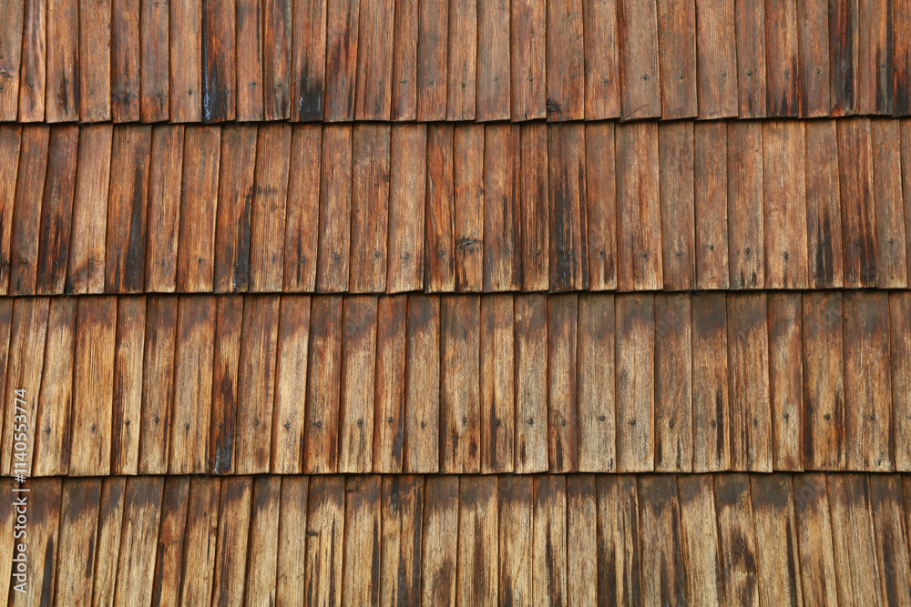 Old weathered wooden shingles creating rustic texture Old weathered wooden shingles creating rustic texture