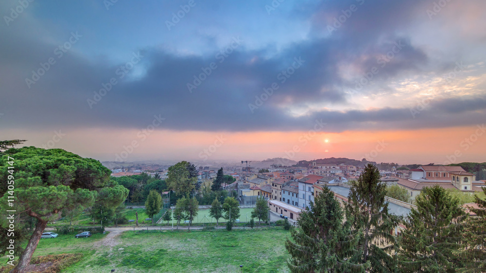 Fototapeta premium Old houses and trees during sunset in beautiful town of Albano Laziale timelapse, Italy