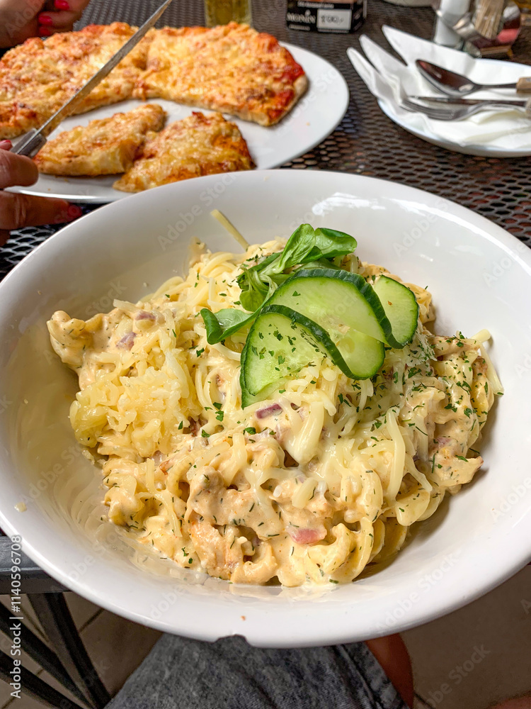 Pasta with bacon and cream sauce. Pasta with bacon and cream sauce.