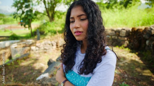 Girl tilts her head lost in thought