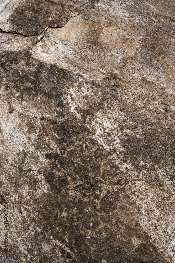 Close-Up of a Natural Stone Surface with Textured Patterns Close-Up of a Natural Stone Surface with Textured Patterns