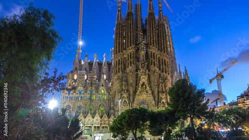 Photography Sagrada Familia, a large church in Barcelona, Spain day to night timelapse