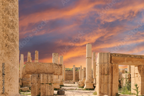 Roman ruins (against the background of a beautiful sky with clouds) in the Jordanian city of Jerash (Gerasa of Antiquity), capital and largest city of Jerash Governorate, Jordan #1140726782