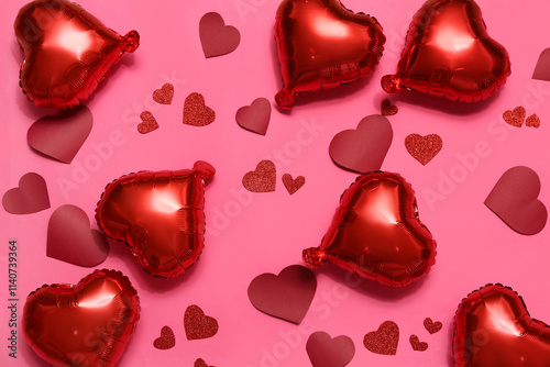 Air balloons and paper hearts on pink background. Valentine's day celebration