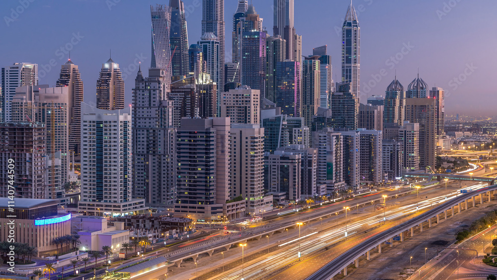 Dubai Marina skyscrapers aerial top view before sunrise from JLT in Dubai night to day timelapse, UAE. Dubai Marina skyscrapers aerial top view before sunrise from JLT in Dubai night to day timelapse, UAE.