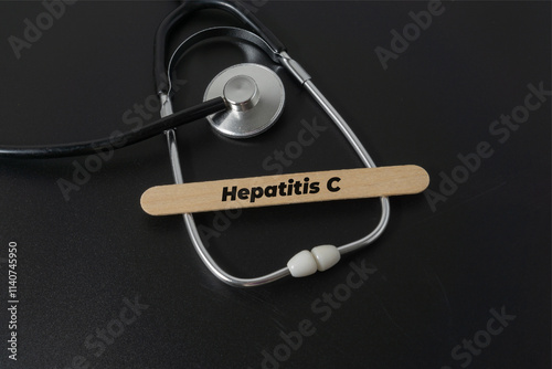 Medical concept with a word Hepatitis C on black background