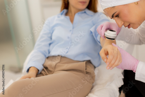 Woman receiving cosmetic tr...