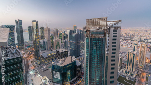 The skyline of the West Bay area from top in Doha night to day timelapse, Qatar.