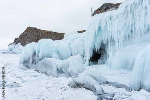 A white van is driving on a snowy road