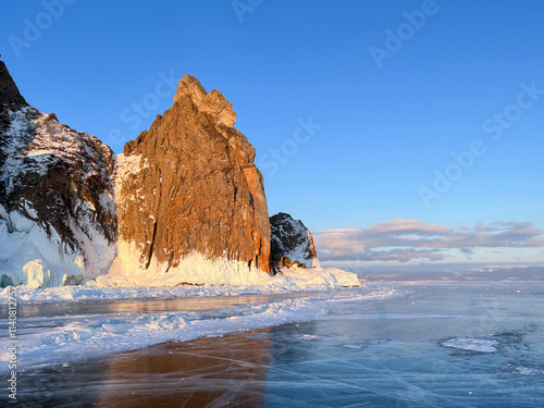 A white van is driving on a snowy road