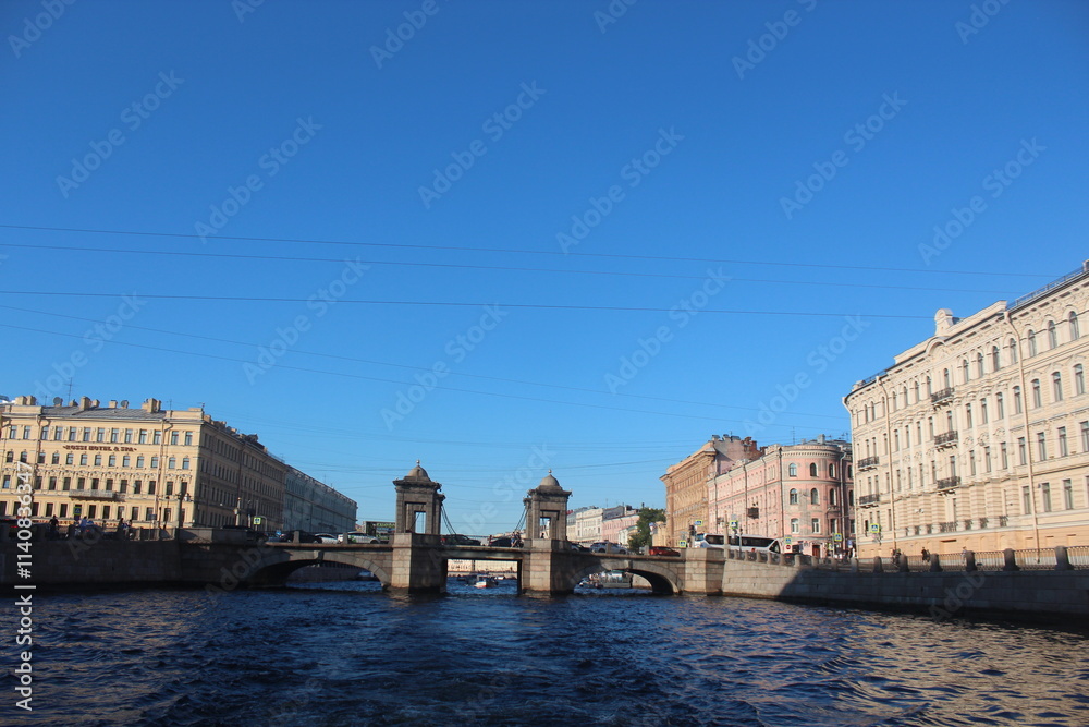 Obraz premium Singer Building, Hermitage Museum Building, Winter Palace, Alexander Column, Palace Square in St. Petersburg, Nevski Prospect, Neva River and tour boats, Peter Pavel Fortress. St.Petersburg Russia