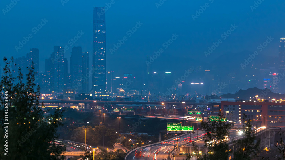 Fototapeta premium Hong Kong Skyline near Container Terminal day to night aerial timelapse