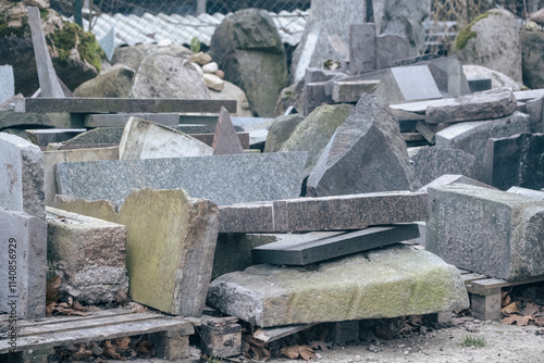 a pile of granite scraps and bigger pieces on pallets photo