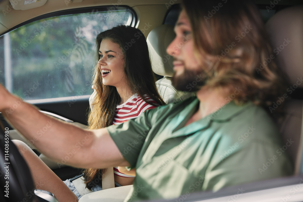 Joyful couple enjoying a drive in a car with natural light illuminating their smiles Joyful couple enjoying a drive in a car with natural light illuminating their smiles