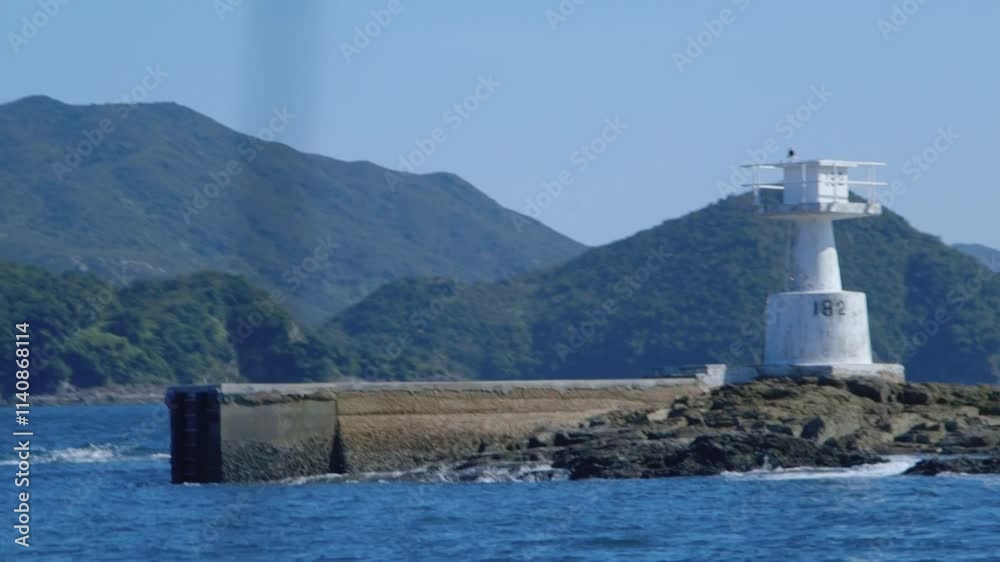 light tower on the shore of the sea, Sai Kung Hong Kong light tower on the shore of the sea, Sai Kung Hong Kong