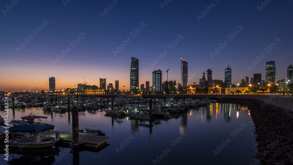 Naklejka premium Yachts and boats at the Sharq Marina night to day timelapse in Kuwait. Kuwait City, Middle East