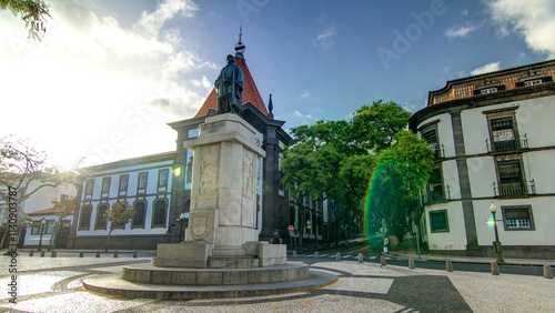 A statue of Zarco stands on the Avenida Arriaga timelapse hyperlapse in Funchal, Madeira, Portugal. photo