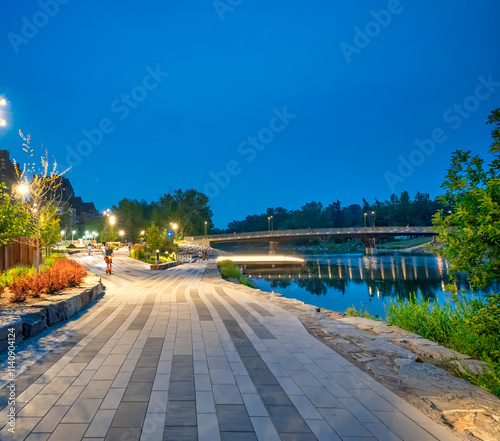 Calgary, Alberta - July 22, 2024: Trail along Calgary waterfront at night