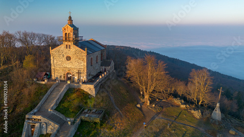 Fotografie Church on Mount Ślęża at sunrise, bird's eye view, Lower Silesia, Poland