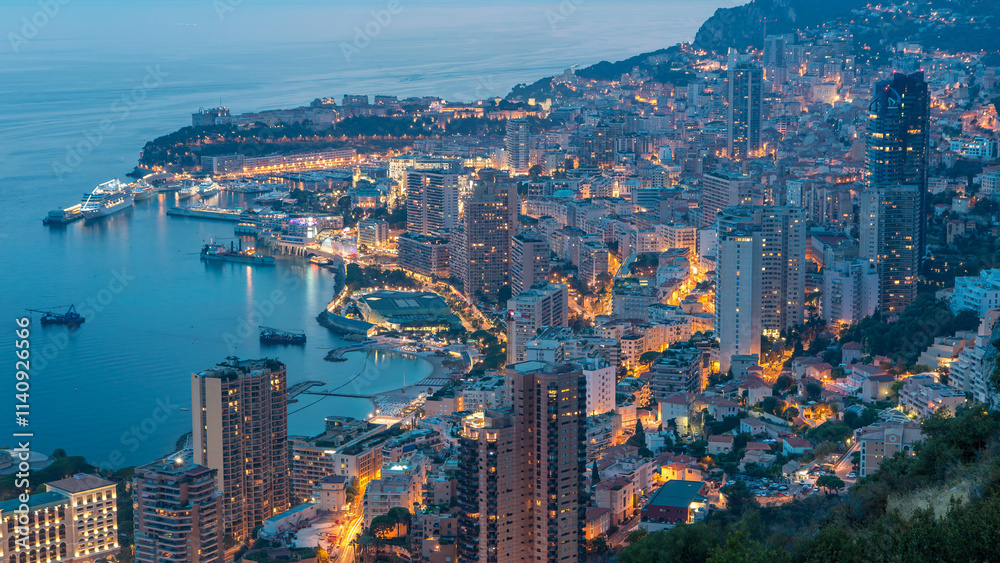 Obraz premium Aerial top view of Monaco from the grand corniche road day to night timelapse, Monaco France