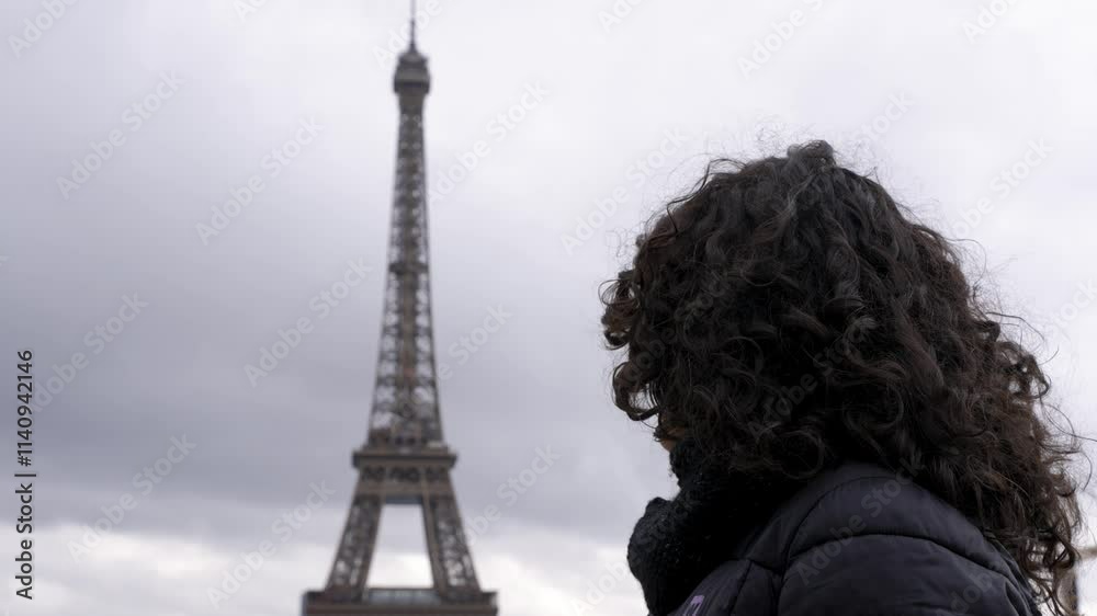 woman in front to the eiffel tower city France Paris 