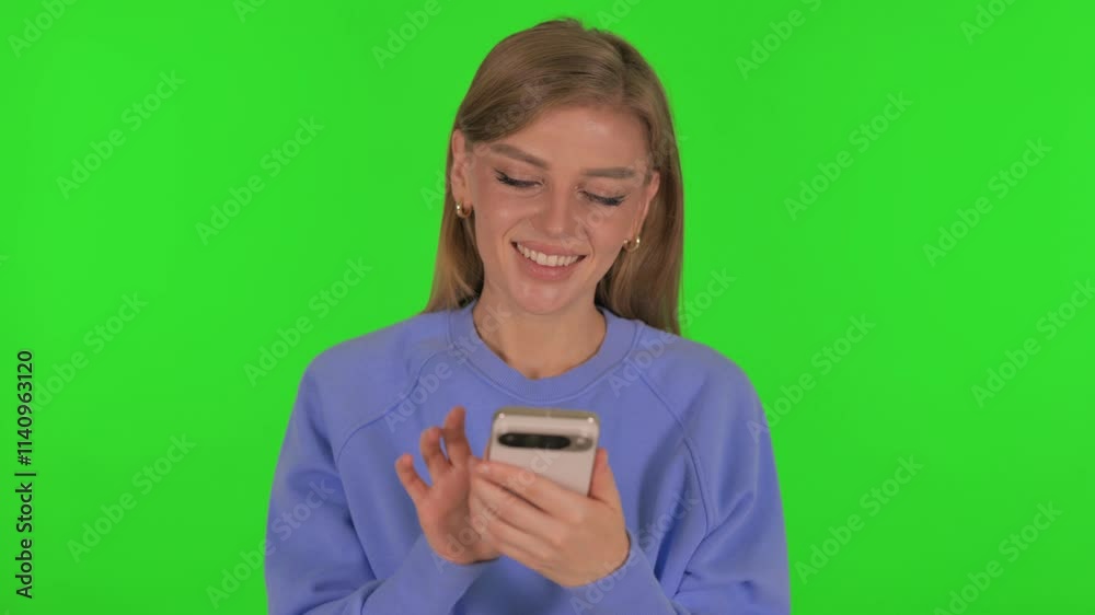 Woman using Phone on Green Background Woman using Phone on Green Background