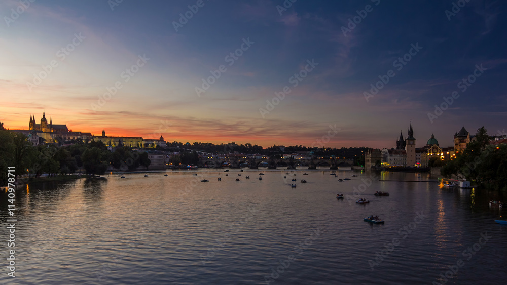 View of the city Prague in Czech Republic day to night timelapse on the Vltava river with beautiful sky View of the city Prague in Czech Republic day to night timelapse on the Vltava river with beautiful sky