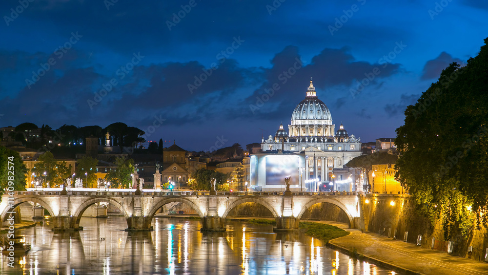 Fototapeta premium St. Peter's Basilica, Saint Angelo Bridge and Tiber River after the sunset day to night timelapse