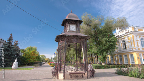 Beautiful park with clock on pavilion in the center of Uralsk timelapse hyperlapse. Western Kazakhstan. photo