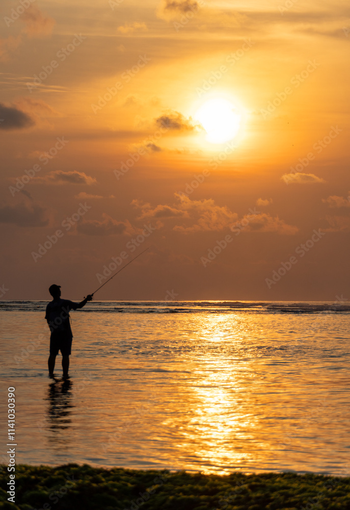 Fototapeta premium silhouette of a fisherman
