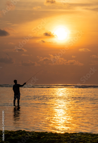 silhouette of a fisherman