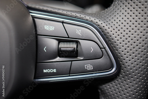 The modern cars steering wheel control panel boosts convenience and performance