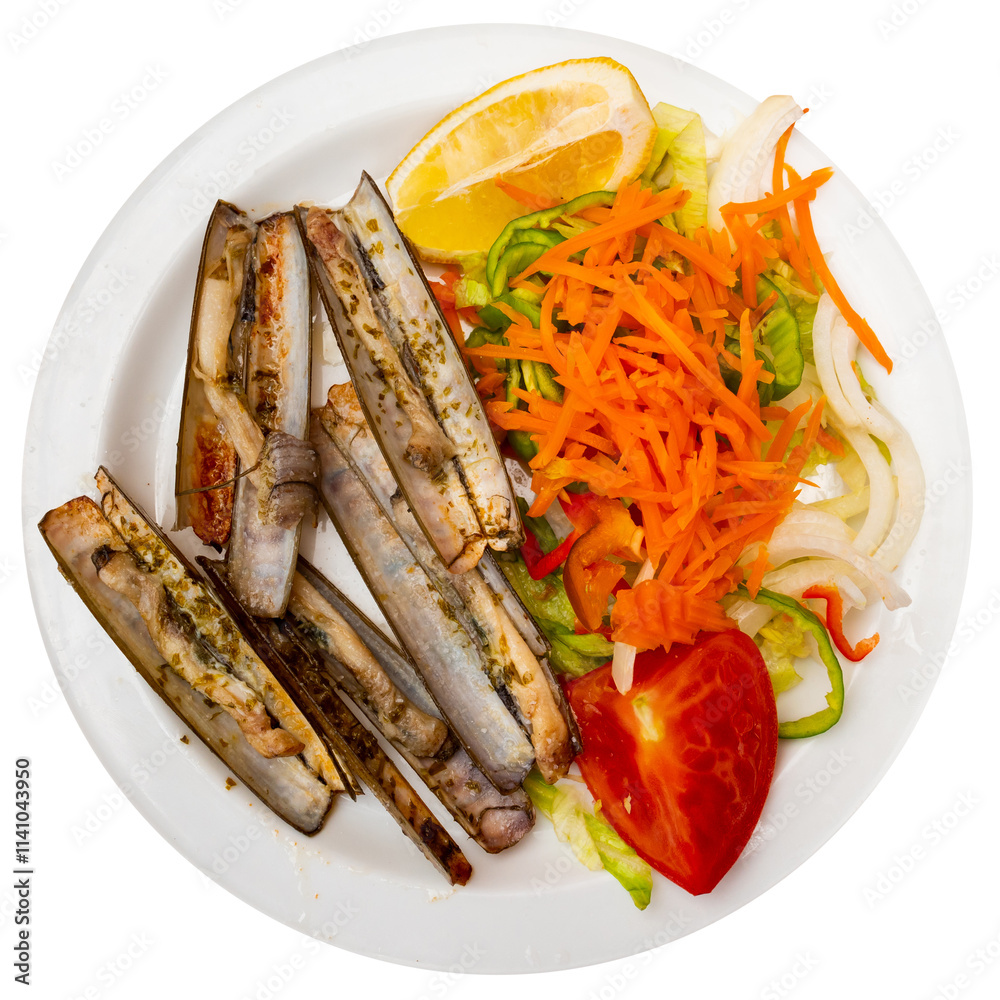 Seafood appetizer. Plate of baked razor clams served with fresh vegetable salad of shredded carrots, onions, tomato and lemon wedge for garnish. Isolated over white background Seafood appetizer. Plate of baked razor clams served with fresh vegetable salad of shredded carrots, onions, tomato and lemon wedge for garnish. Isolated over white background